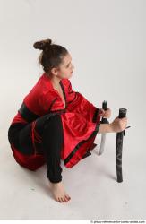 Katerina Ninja Kneeling Pose